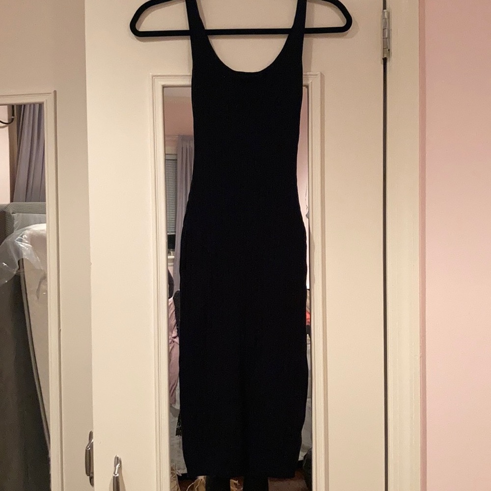 Black form fitting mid length dress